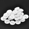 round white with 2 stitching holes