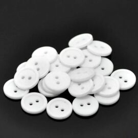 round white with 2 stitching holes